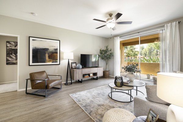 Spacious living room with stylish decor in Mission Grove Park Apartments