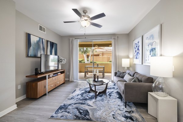 Spacious living room with modern decor in Mission Grove Park Apartments