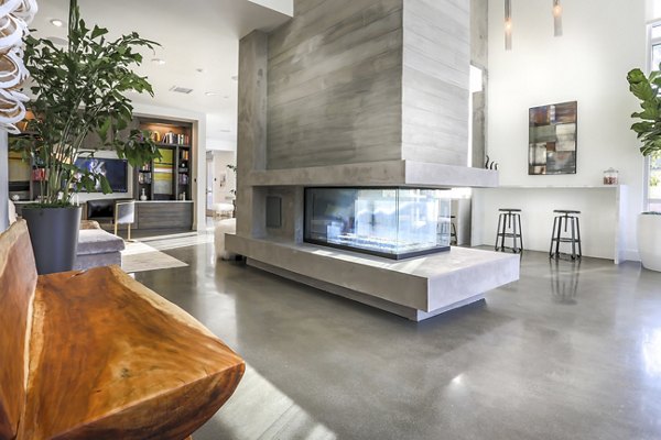 Clubhouse with elegant furnishings and modern decor at 201 Marshall Apartments in a luxurious Greystar community