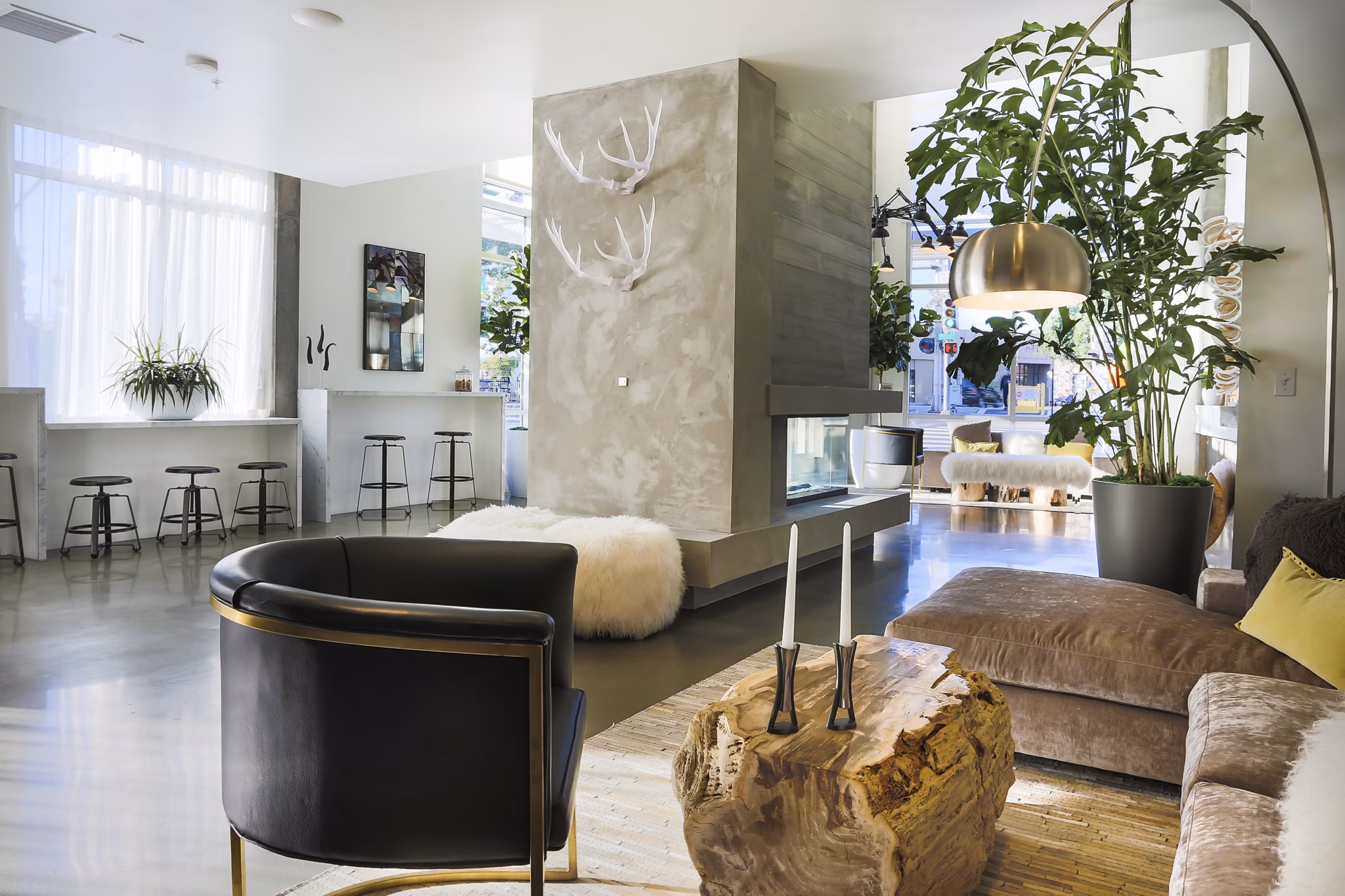 Clubhouse with modern design and cozy seating at 201 Marshall Apartments
