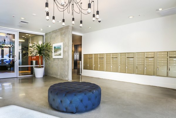 Mail room with secure package lockers at 201 Marshall Apartments