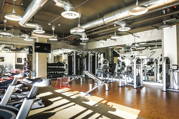 Modern fitness center with advanced equipment at 201 Marshall Apartments, a luxury Greystar property