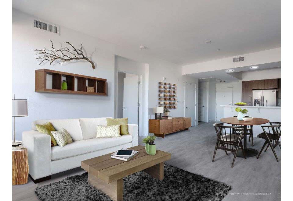 Spacious living room with modern decor in 201 Marshall Apartments, luxury residences by Greystar