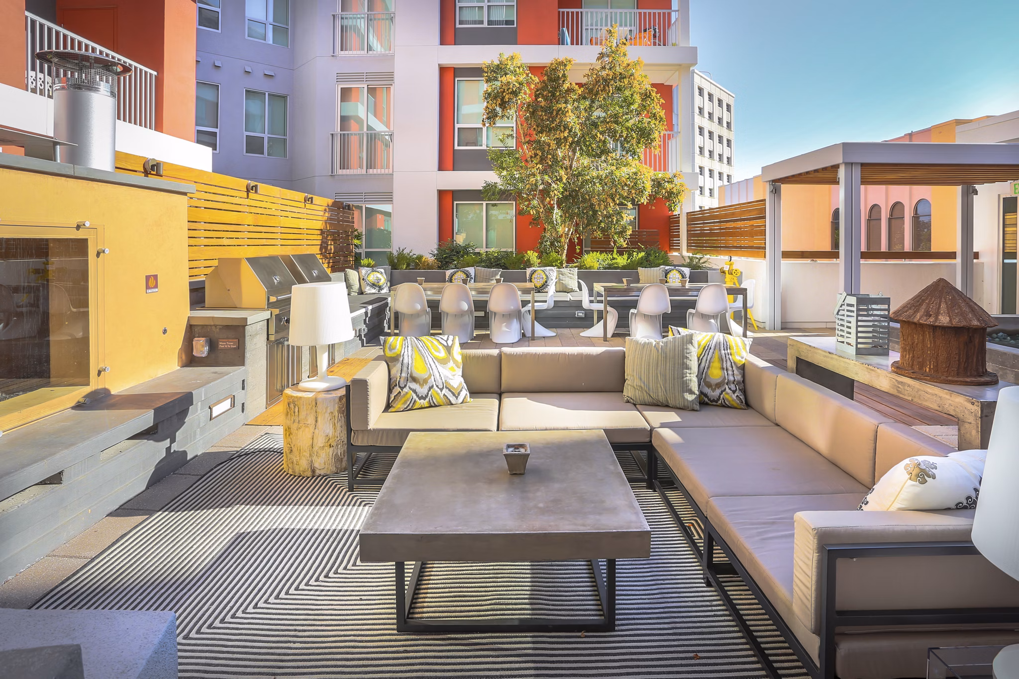 Courtyard with lush landscaping at 201 Marshall Apartments in Redwood City, offering serene outdoor seating and vibrant garden spaces