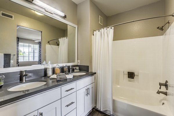 Bathroom featuring modern design and sleek fixtures at Signature Point Apartments in luxury Greystar community