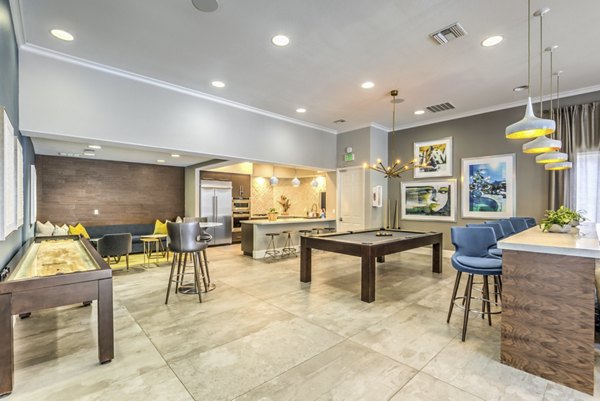Clubhouse featuring modern design and stylish seating at Signature Point Apartments in luxury setting