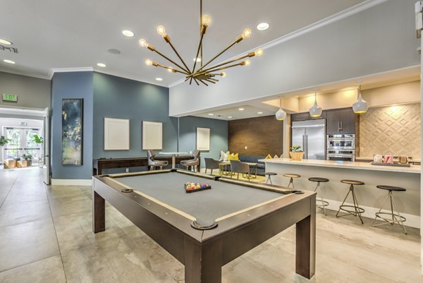 Elegant clubhouse interior with modern furnishings at Signature Point Apartments, perfect for residents' gatherings and events