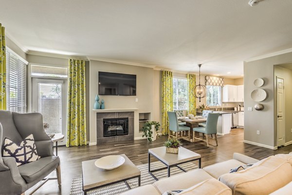 Modern living room with stylish decor at Signature Point Apartments, highlighting luxury and comfort in Greystar's premium properties
