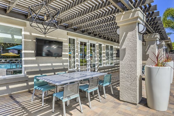 Patio with comfortable seating at Signature Point Apartments offering outdoor relaxation spaces