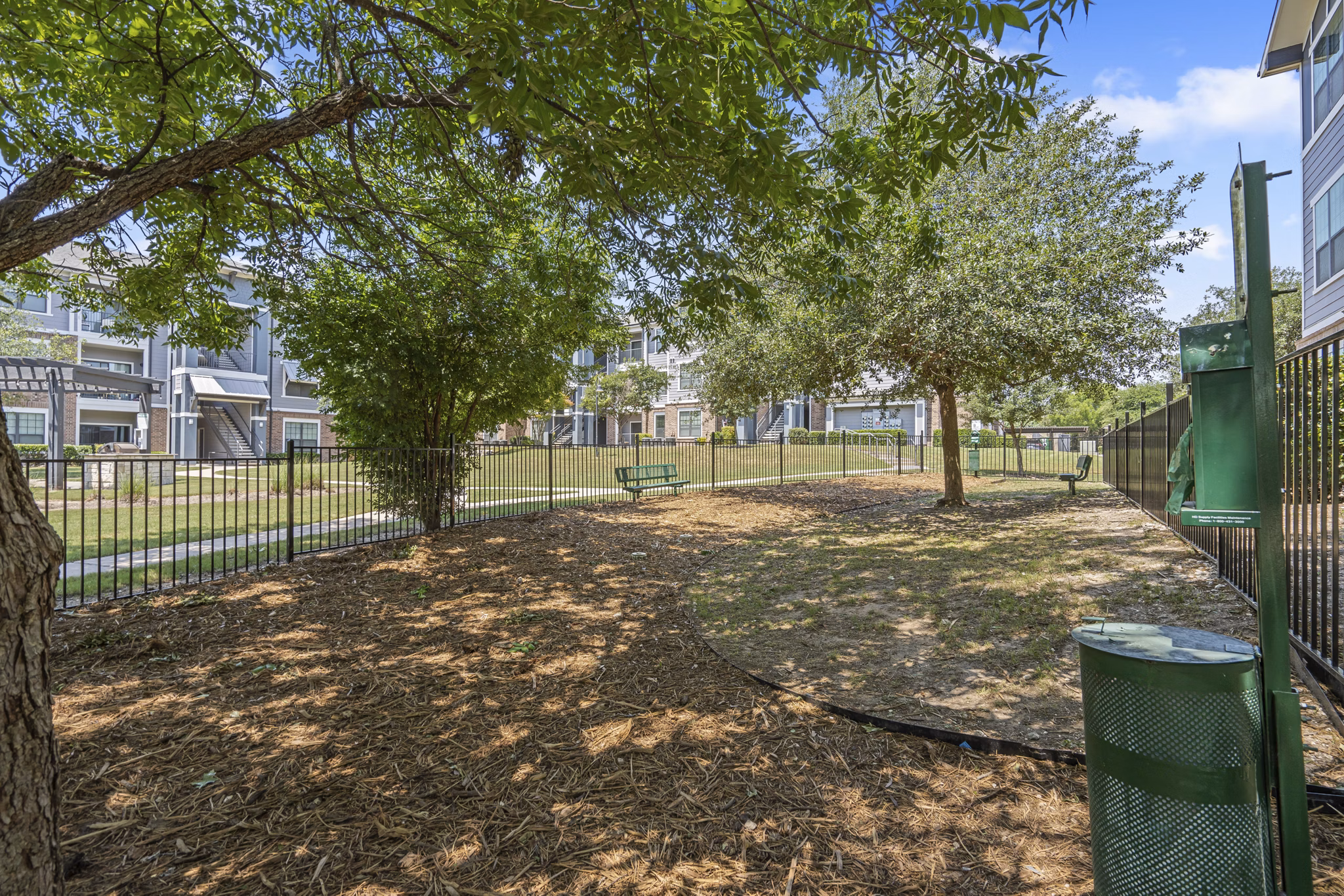 dog park at The Oaks at Techridge Apartments