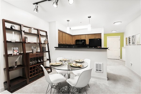 Dining area with sleek modern design at Dexter Lake Union Apartments
