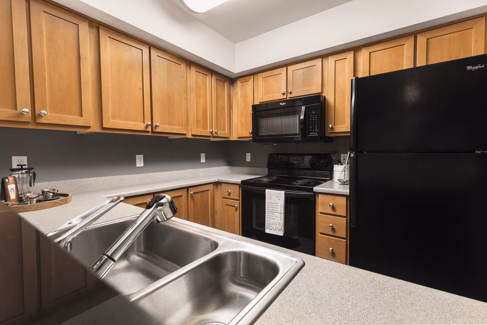 Modern kitchen with stainless steel appliances at Dexter Lake Union Apartments