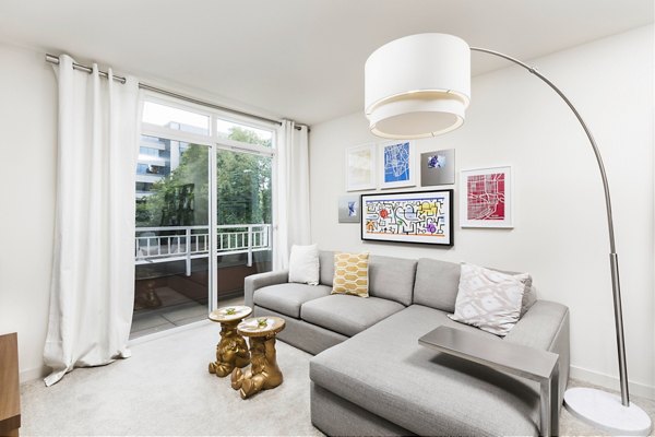 Spacious living room with modern decor at Dexter Lake Union Apartments