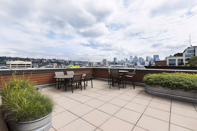 Rooftop deck with skyline views at Dexter Lake Union Apartments