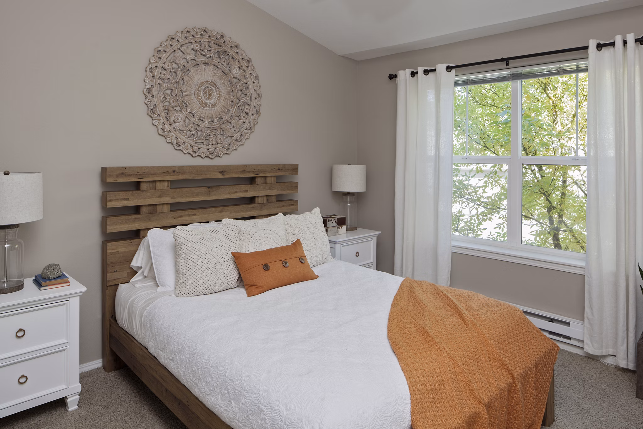 Spacious bedroom featuring contemporary design elements at Lions Gate South Apartments