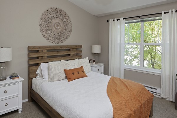 Spacious bedroom featuring contemporary design elements at Lions Gate South Apartments