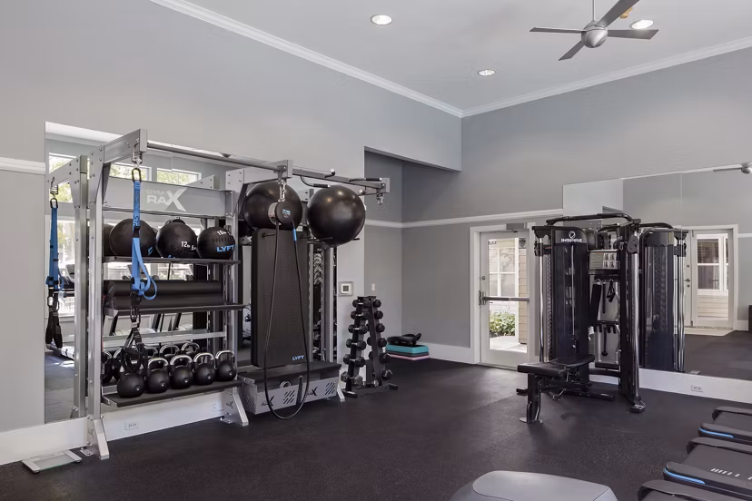 Modern fitness center with advanced equipment at Lions Gate South Apartments