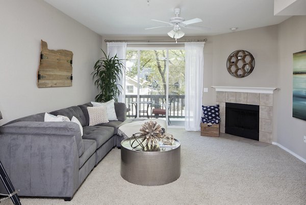 Spacious living room with modern decor at Lions Gate South Apartments