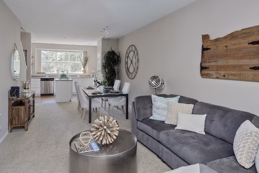 Spacious living room with modern decor in Lions Gate South Apartments