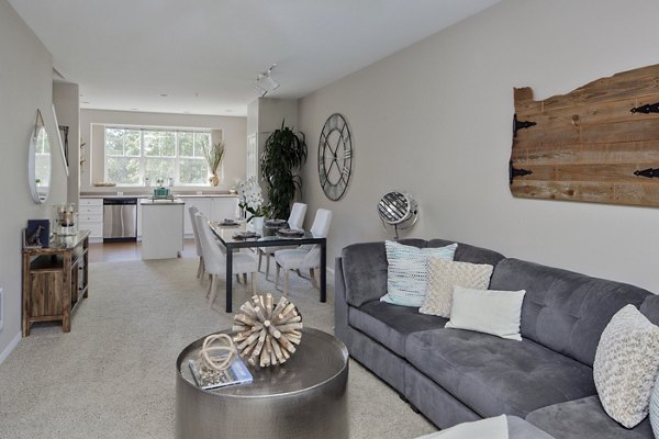 Spacious living room with modern decor in Lions Gate South Apartments