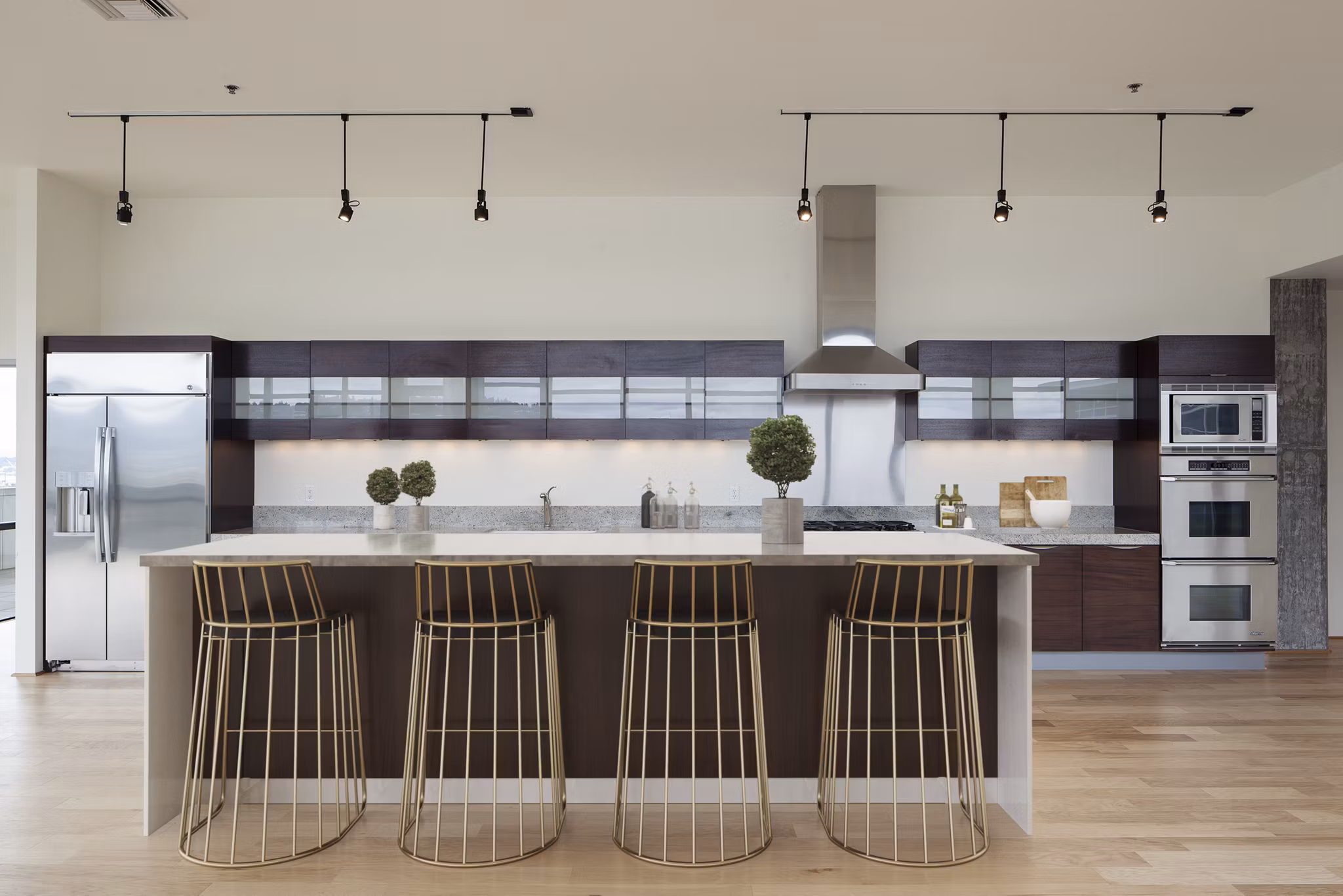 Sophisticated clubhouse featuring modern decor and ample seating at The Wyatt Apartments luxury residences