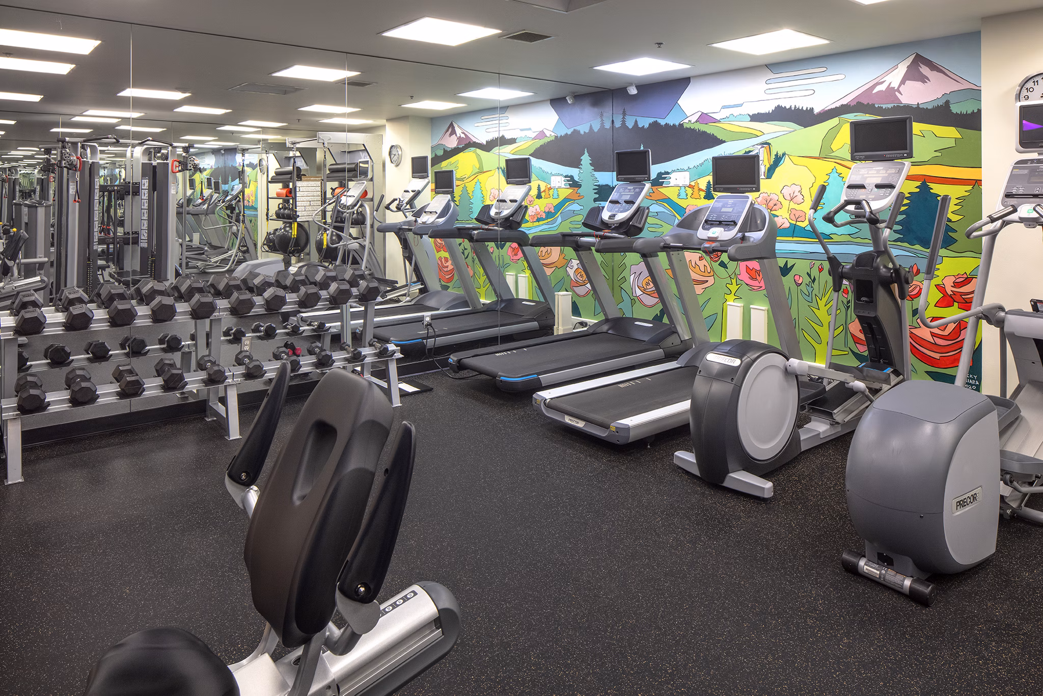 Modern fitness center with state-of-the-art equipment at The Wyatt Apartments luxury community