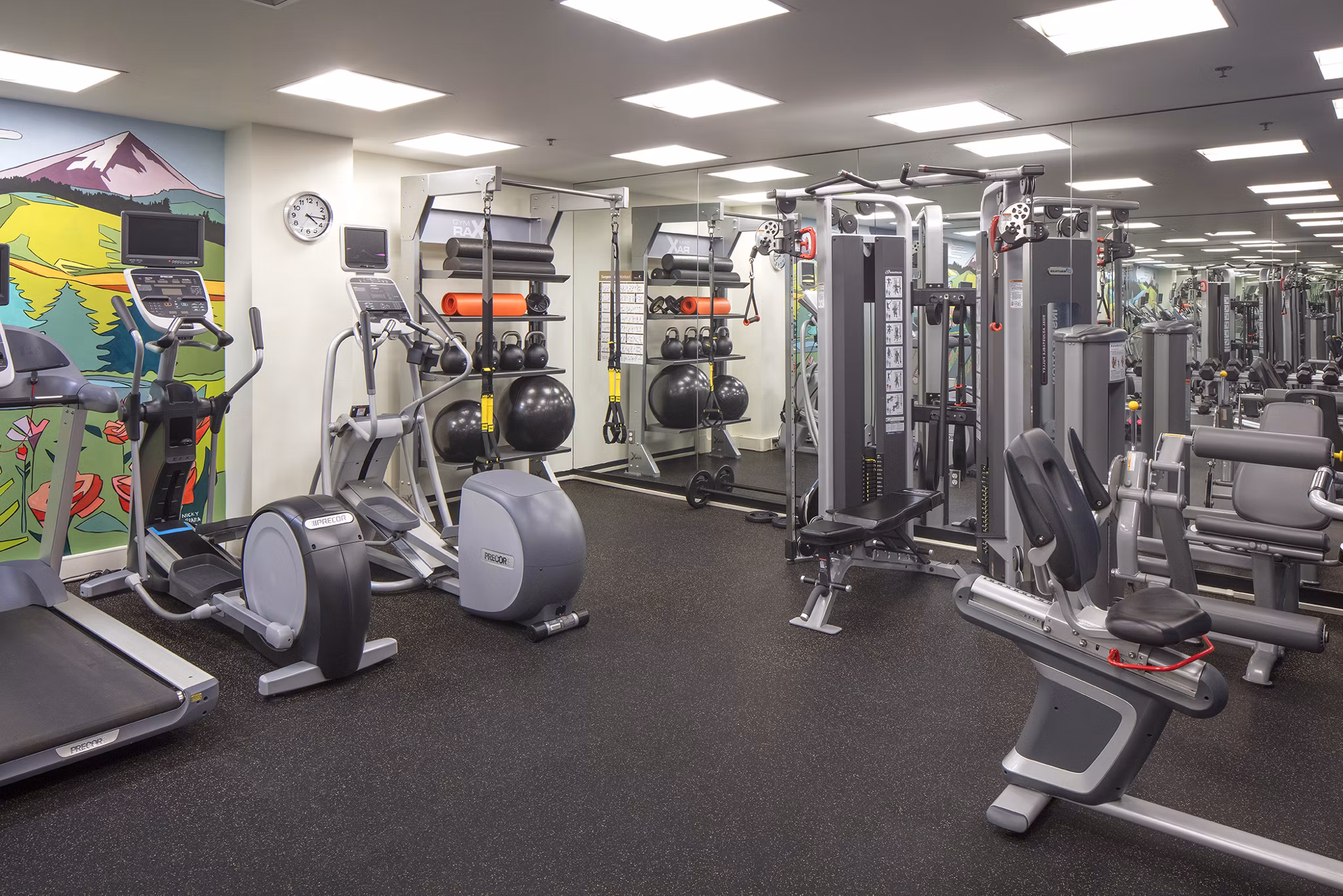 Modern fitness center featuring state-of-the-art equipment at The Wyatt Apartments