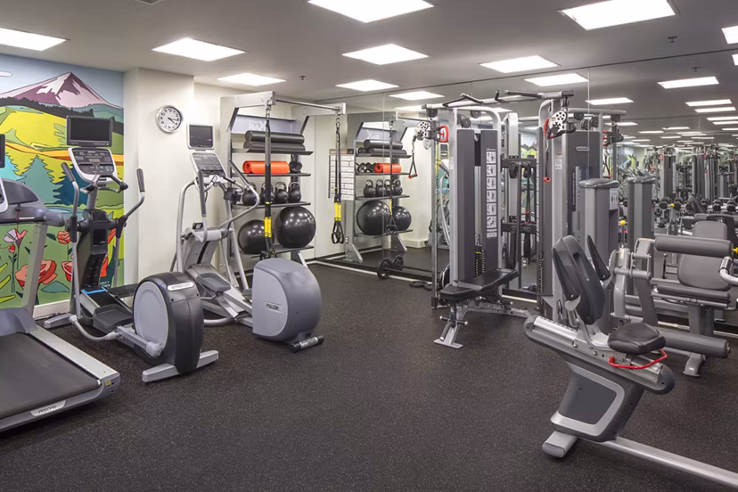 Modern fitness center featuring state-of-the-art equipment at The Wyatt Apartments