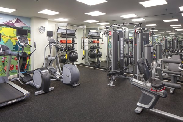 Modern fitness center featuring state-of-the-art equipment at The Wyatt Apartments