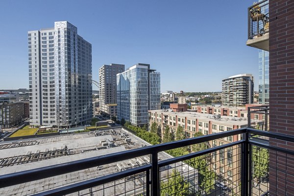 Chic patio with modern furniture at The Wyatt Apartments, offering luxury outdoor living space for residents to relax and socialize