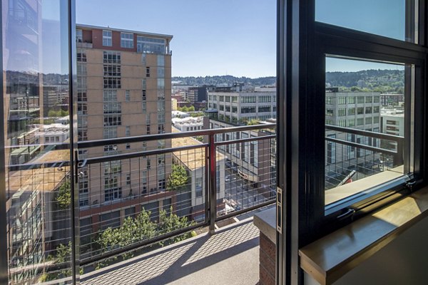 Modern patio with comfortable seating at The Wyatt Apartments, ideal for relaxing and socializing outdoors