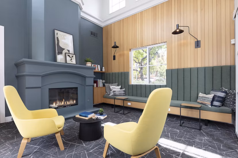 Modern clubhouse with stylish decor at Bridgepointe Apartments, offering luxury living in a vibrant community