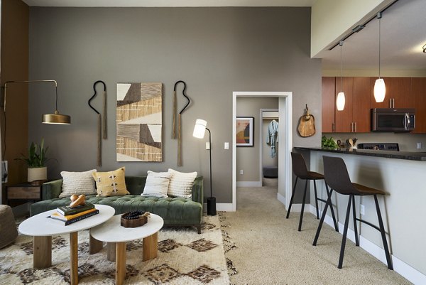 Modern clubhouse with stylish decor at Bridgepointe Apartments, offering luxury living in a vibrant community