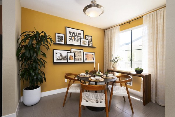 Dining room with elegant lighting and modern furniture at Bridgepointe Apartments