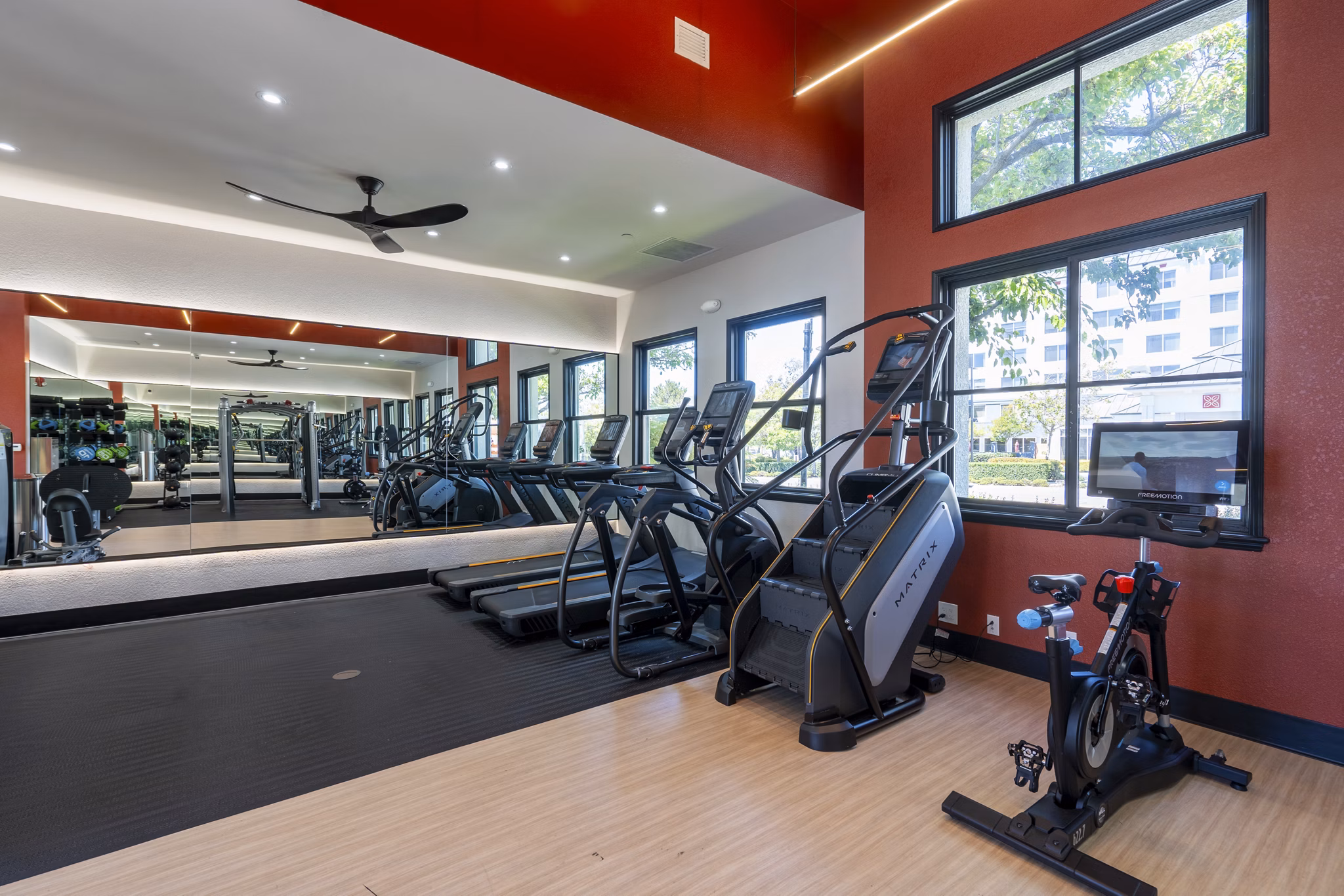 Modern fitness center with state-of-the-art equipment at Bridgepointe Apartments