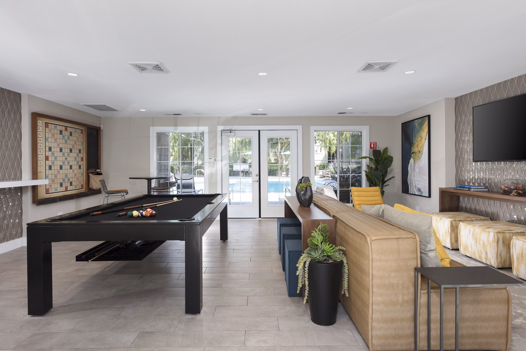 Central Park at Whisman Station: Stylish clubhouse featuring modern design and cozy seating areas for residents to relax and socialize