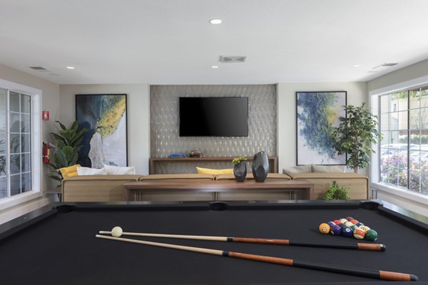 Clubhouse with modern design and community spaces at Central Park at Whisman Station Apartments