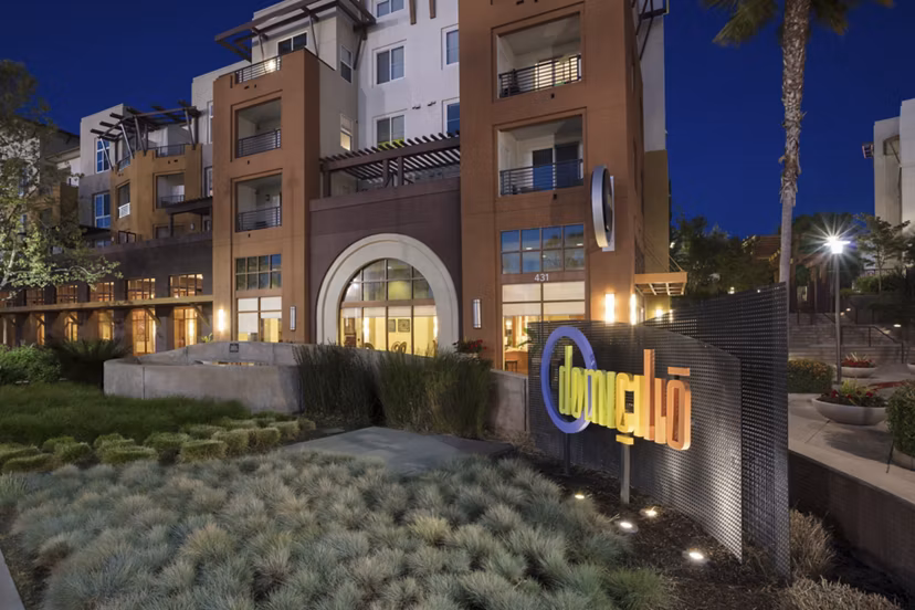 Domicilio Apartments: Contemporary signage at the luxury property attracting residents to the vibrant community lifestyle
