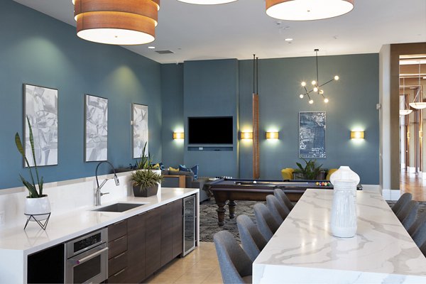 Club room with stylish seating and modern decor at Domicilio Apartments Luxury Apartments