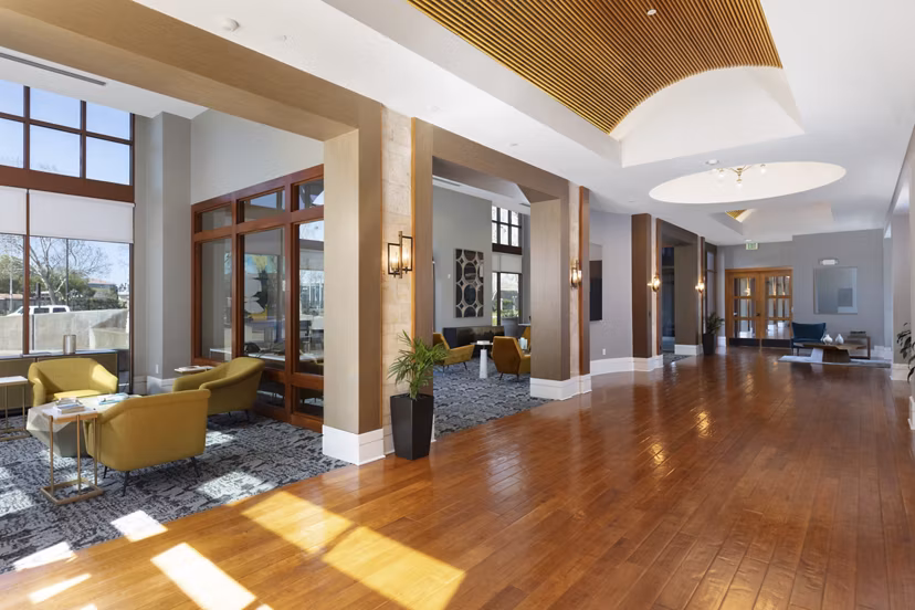 Clubhouse featuring modern lounge and entertainment spaces at Domicilio Apartments