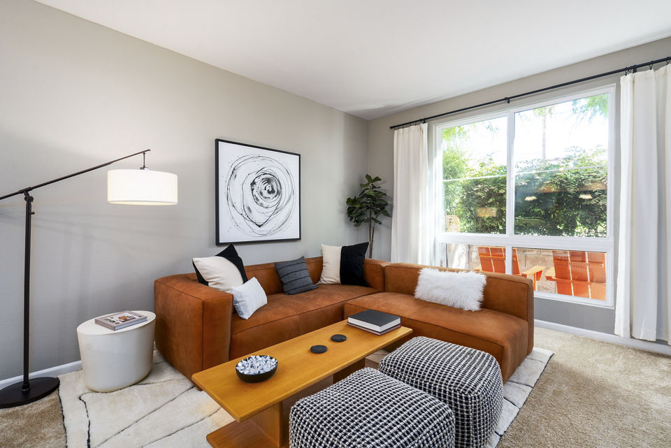 Living room with modern decor and spacious layout at Domicilio Apartments luxury residences