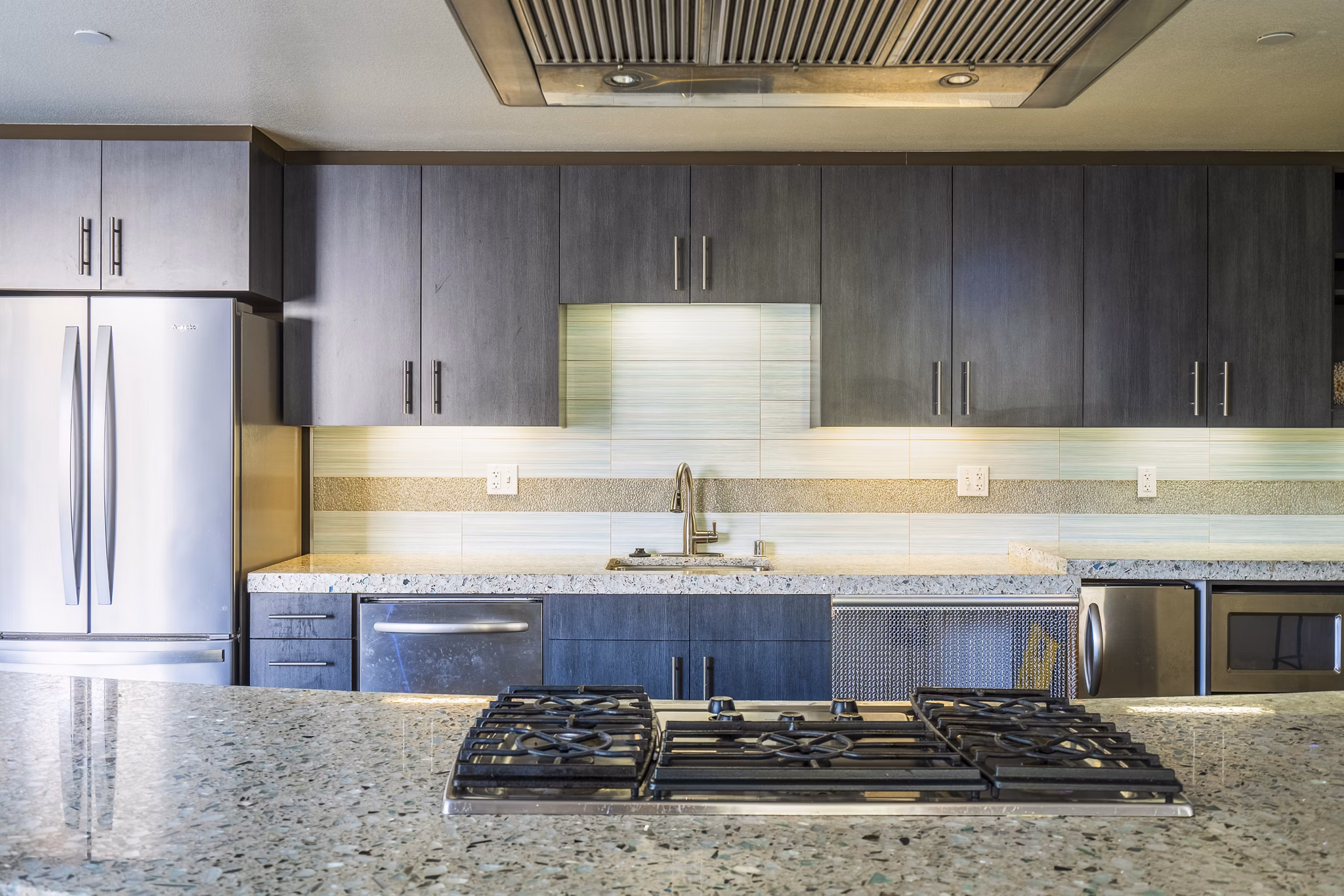 Modern clubhouse with stylish seating and entertainment options at Elements Apartments