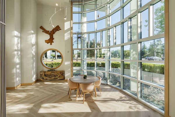Modern clubhouse with stylish furnishings at Elements Apartments, offering luxury amenities for residents
