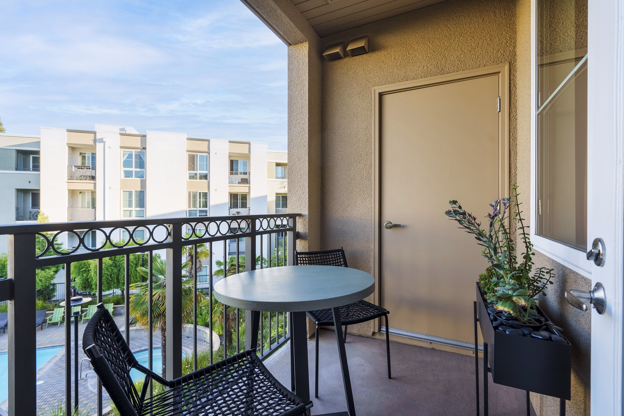 Private patio with modern seating at Elements Apartments in San Francisco