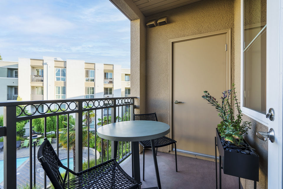Private patio with modern seating at Elements Apartments in San Francisco