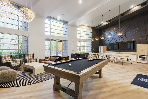 Clubhouse with modern furnishings at Mosaic Apartments offering luxury community spaces