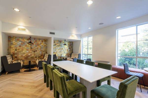 Dining room with modern decor and natural light at Mosaic Apartments