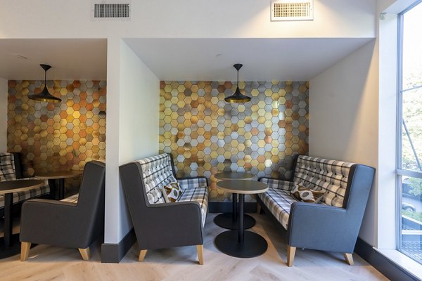 Dining room featuring modern decor and ample seating at Mosaic Apartments