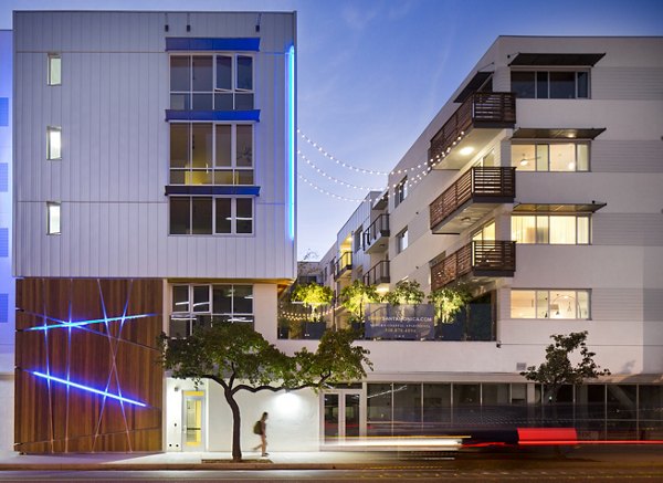 Night time view of building side at Sway Apartments