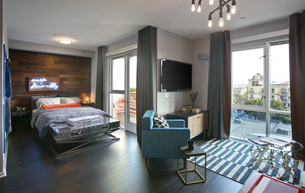 Bedroom with modern decor at Sway Apartments in Brooklyn